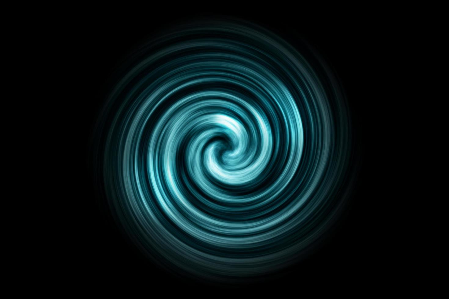 Glowing spiral tunnel with light fog on black background photo