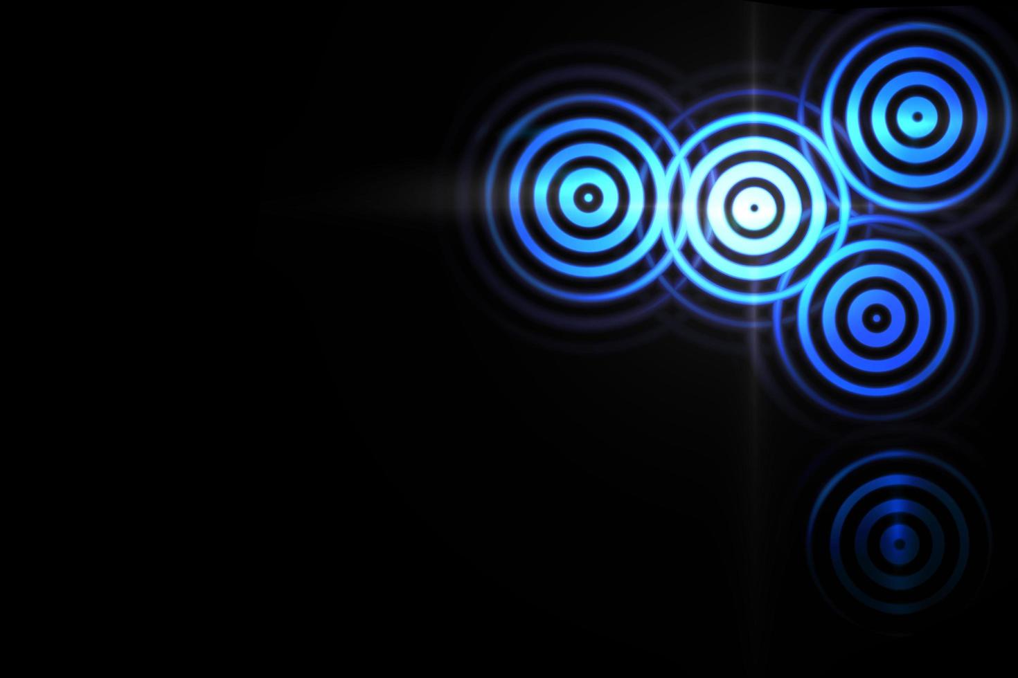 Abstract light ring effect with blue sound waves oscillating on black background photo