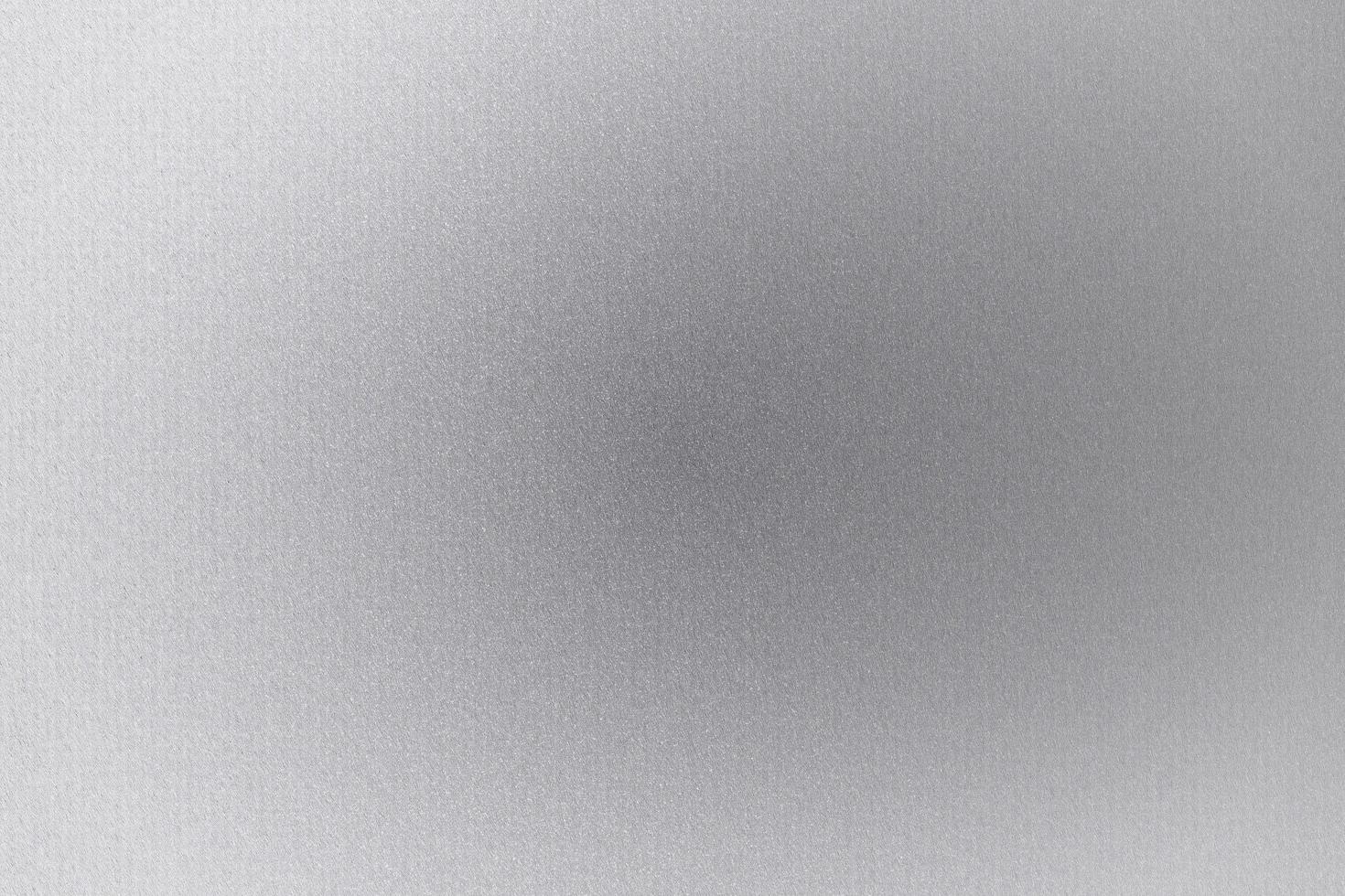 Brushed silver metallic foil surface, abstract texture background photo
