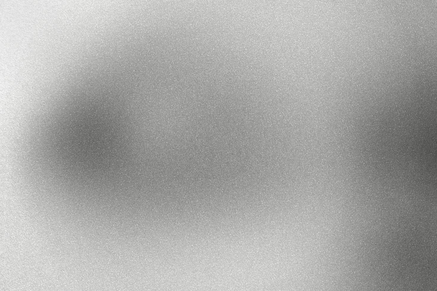 Brushed gray metal foil surface, abstract texture background photo