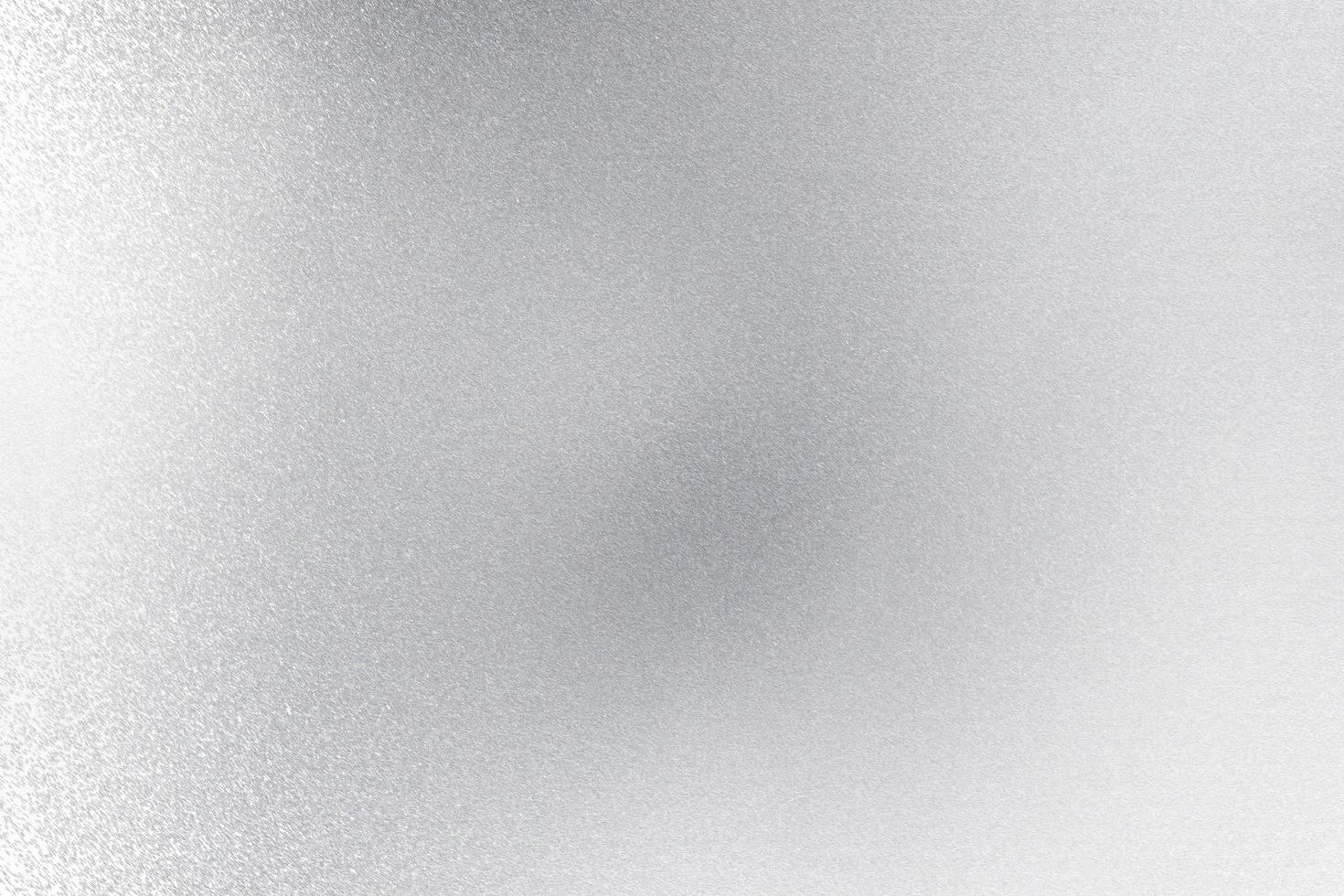 Shiny brushed silver metallic wall, abstract texture background photo