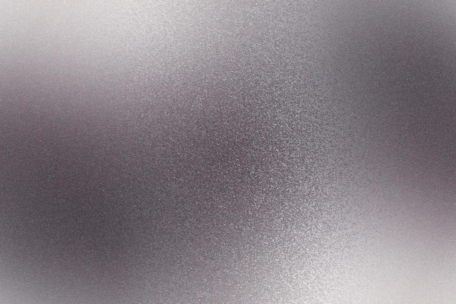 Texture of reflection on rough purple steel wall, abstract background photo