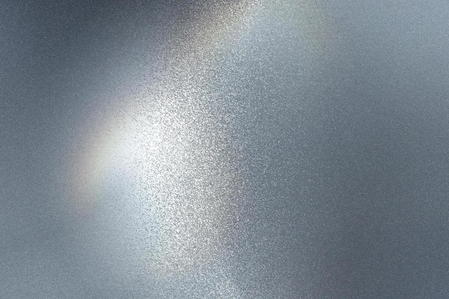 Brushed black metallic wall with scratched surface, abstract texture background photo