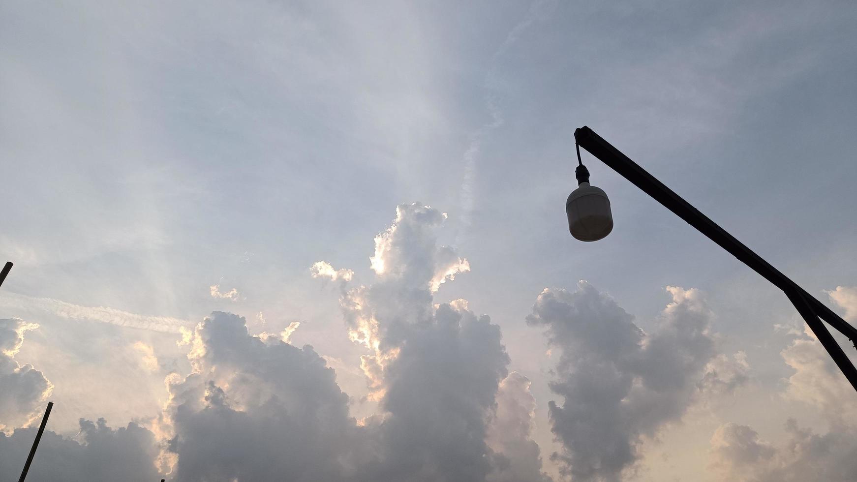 Light bulb and sky background clouds sunlight photo