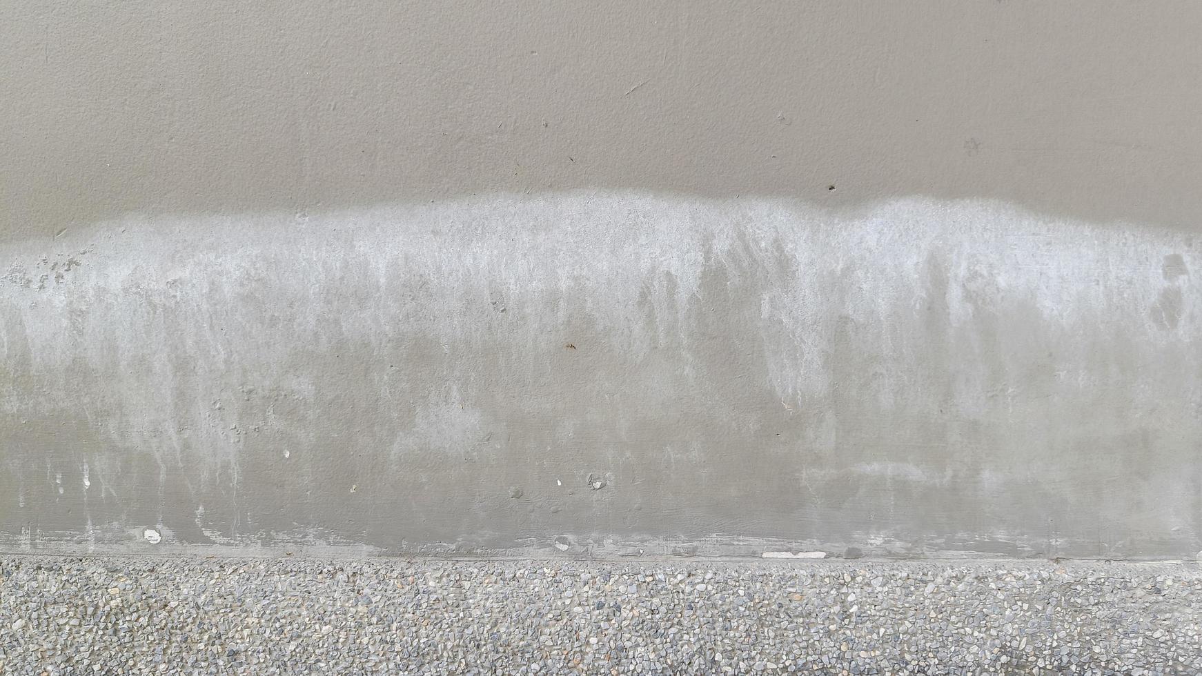 Aged grey cement wall texture with mold photo