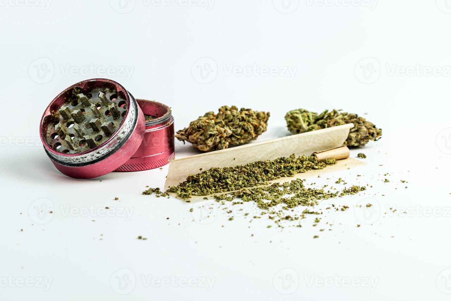 Close-up of medical marijuana buds on white background photo