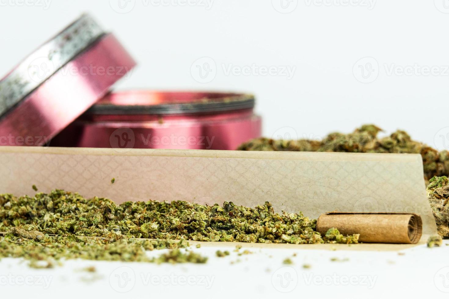 Close-up of medical marijuana buds on white background photo