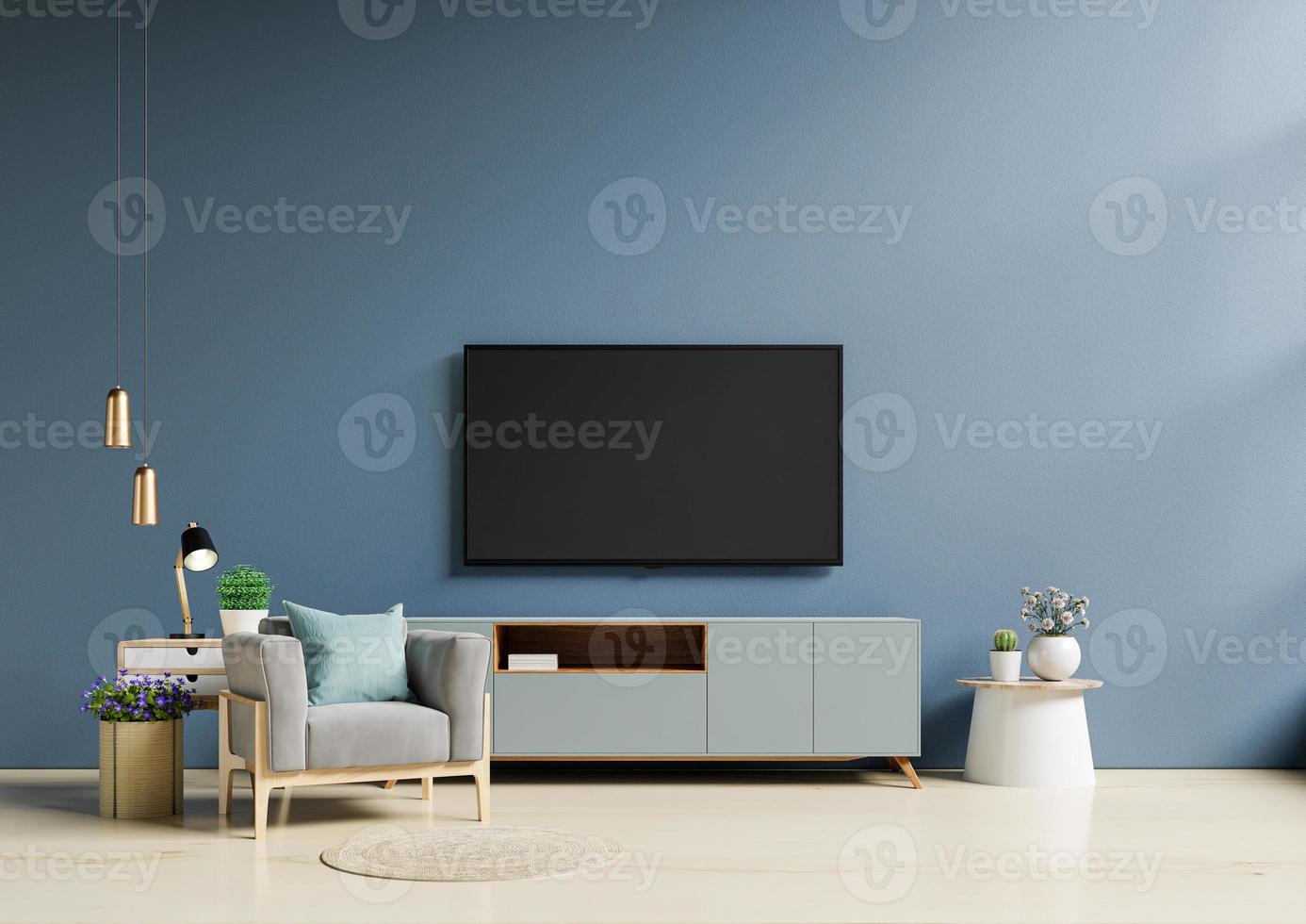 TV in modern living room with armchair have empty dark blue wall background.  6933875 Stock Photo at Vecteezy