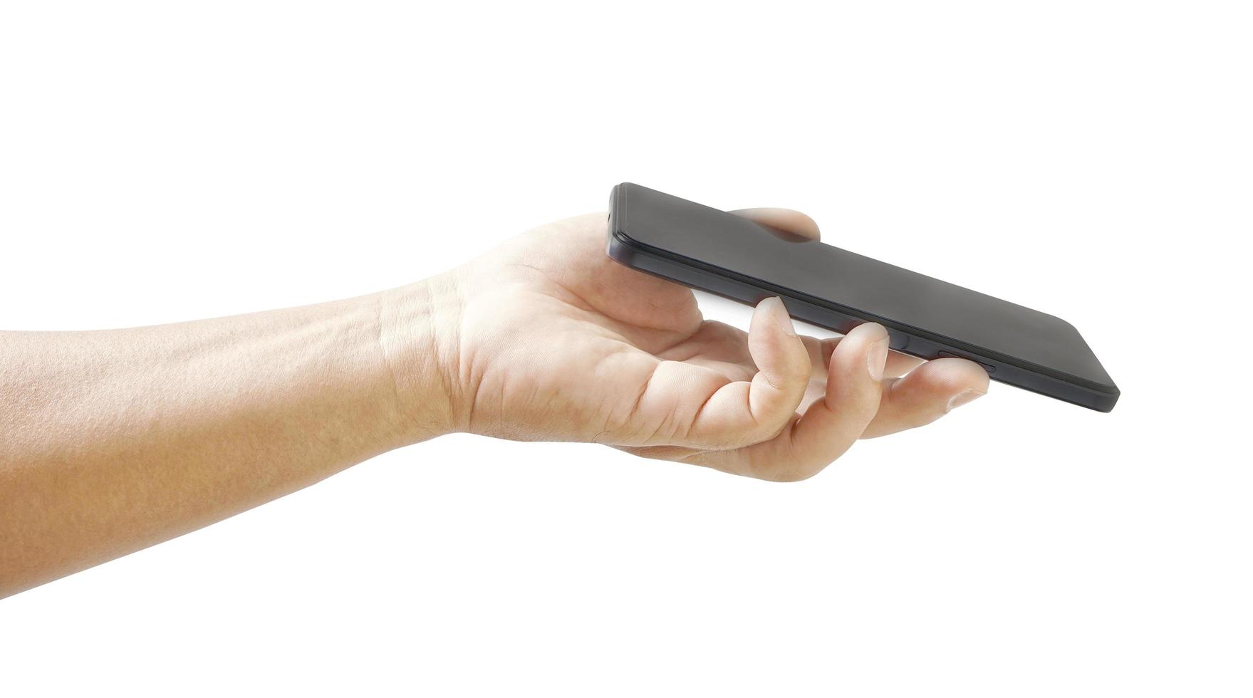 Holding the phone  to scan. photo