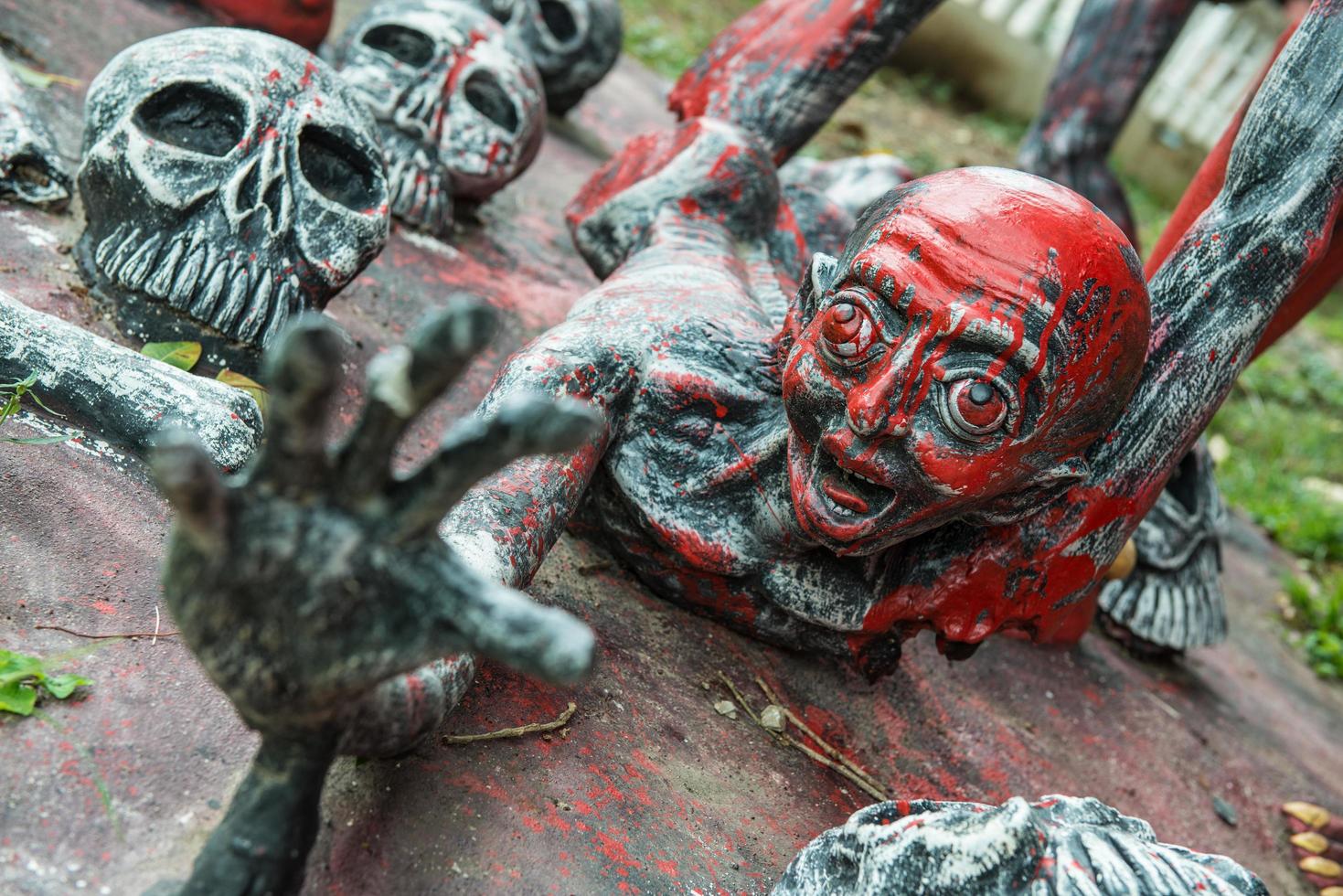 The devil sculpture in the mock up hell normally saw in many Buddhist temple around Thailand. photo