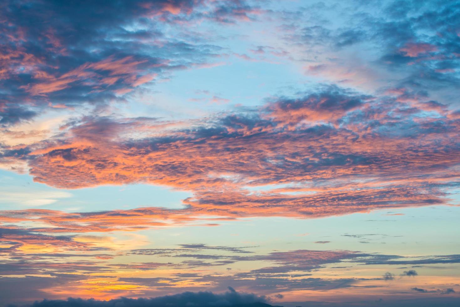 Beautiful dramatic moody sky during the sunset. photo