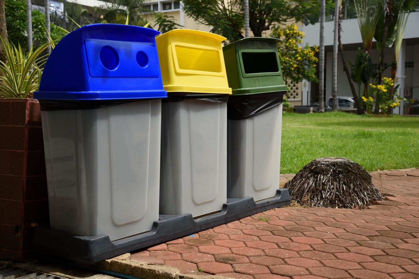 Garbage bins separated by colors photo