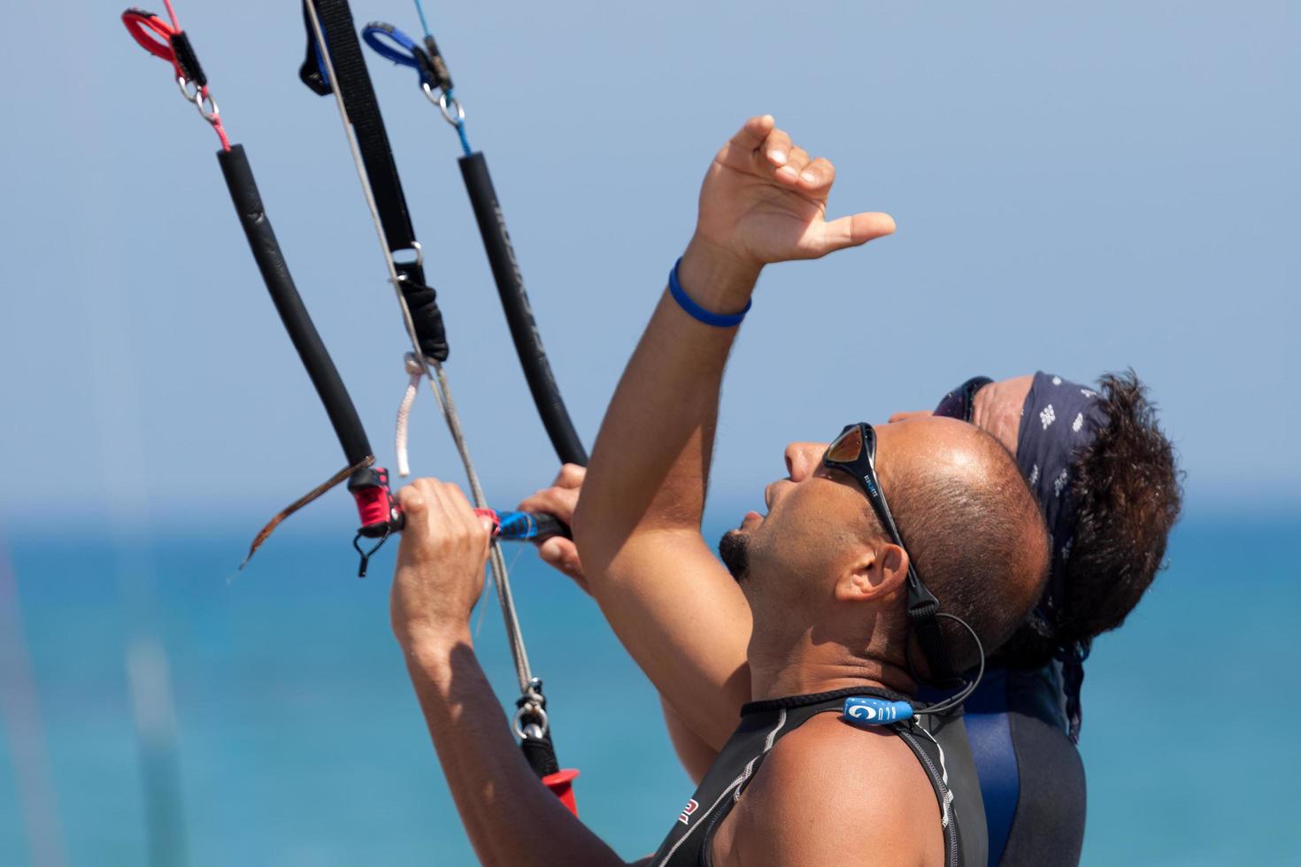 AVDIMOU, CYPRUS, GREECE, 2009. Learning to kite surf photo