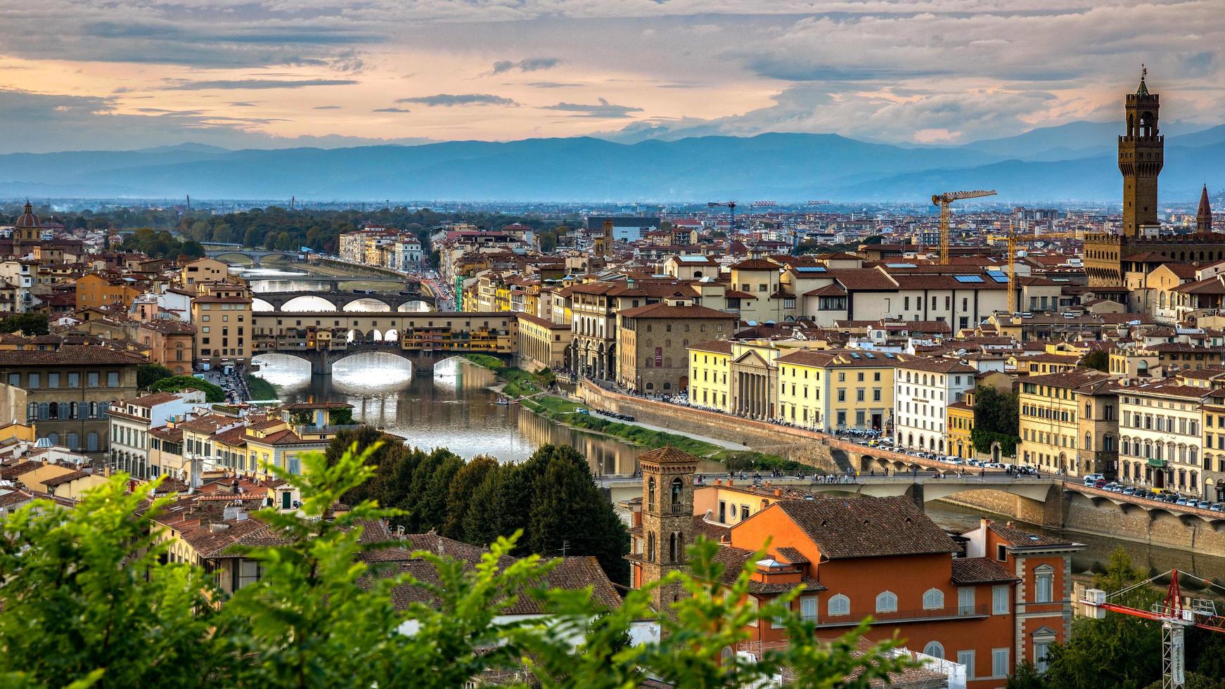 FLORENCE, TUSCANY, ITALY, 2019. View of buildings along and across the River Arno photo