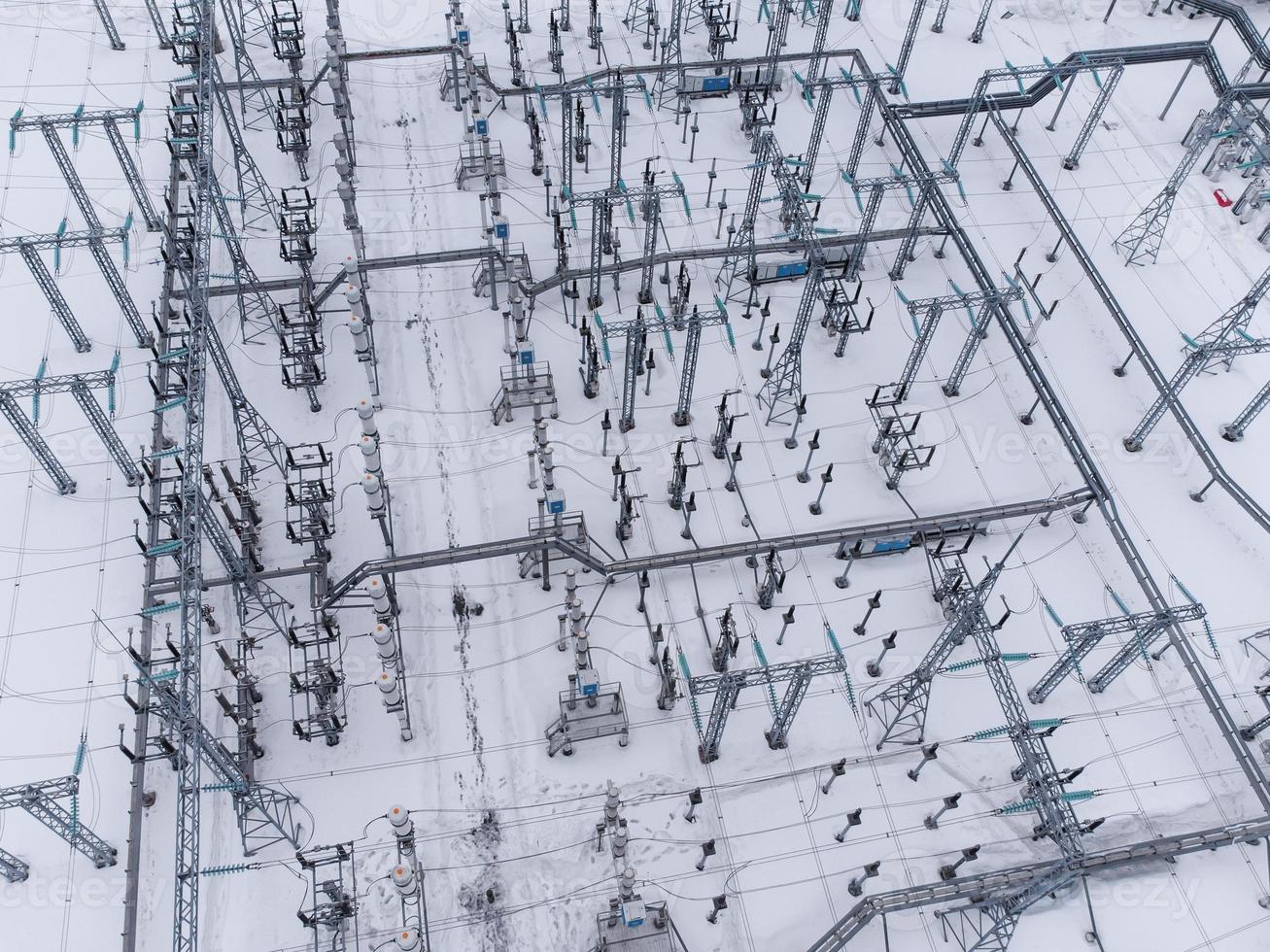 Aerial view of a high voltage electrical substation in winter season. photo