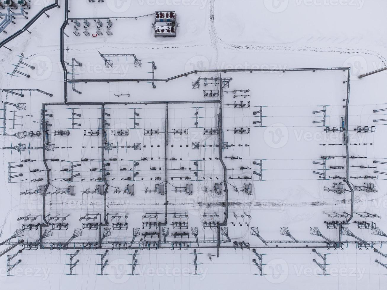 Aerial view of a high voltage electrical substation in winter season. photo