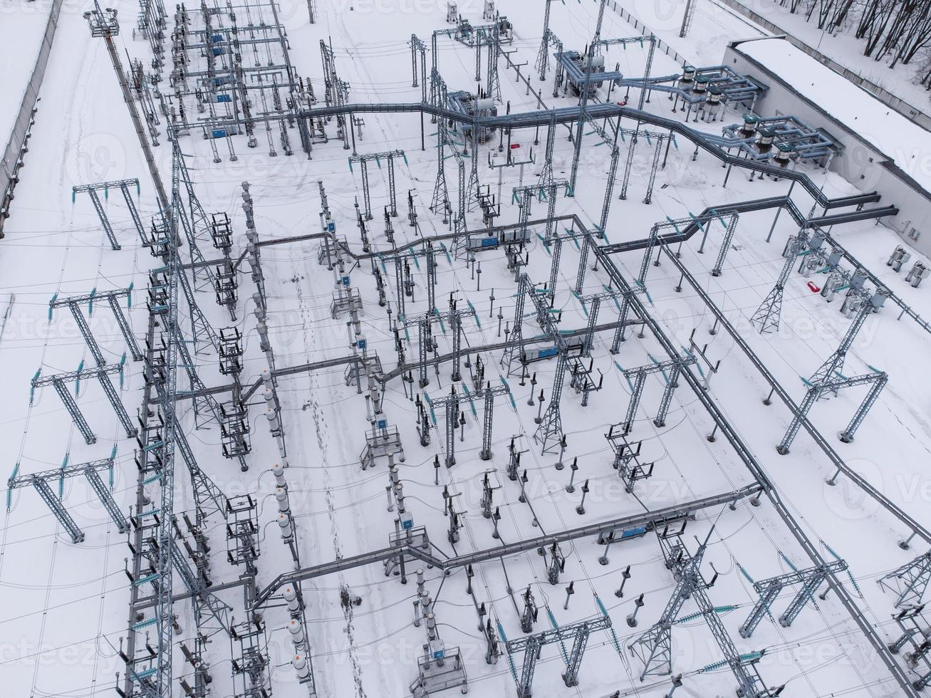 Aerial view of a high voltage electrical substation in winter season. photo