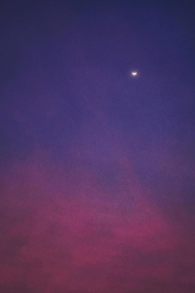 Crescent moon in the night photo