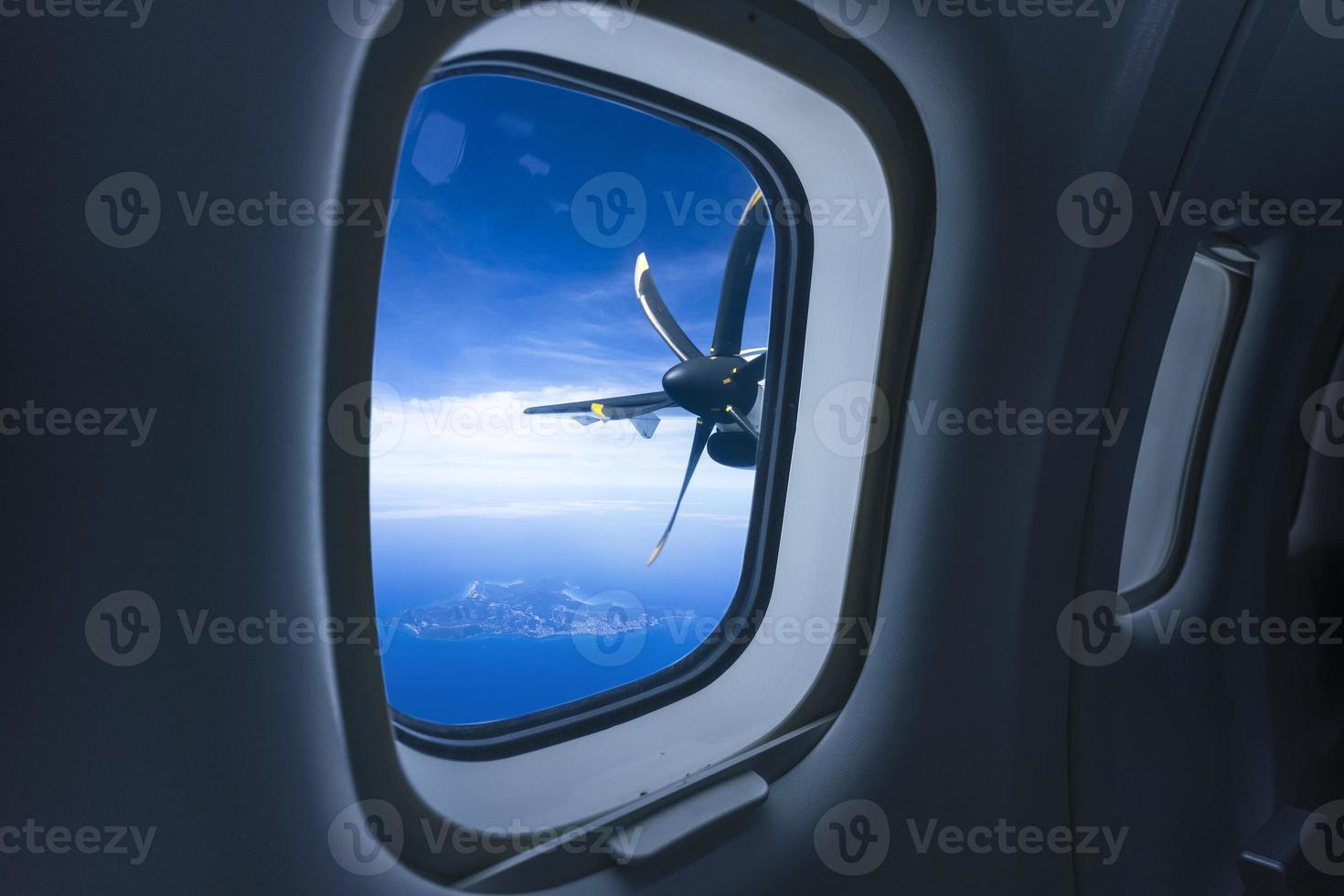 ATR machine and view of Lan Island from plane window, Pattaya, Thailand. photo