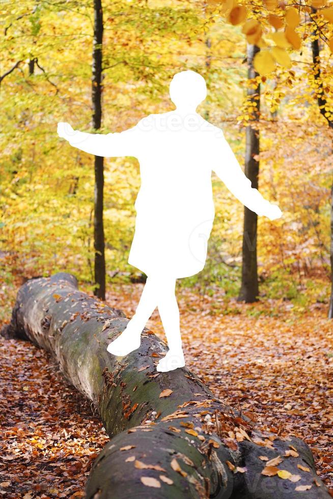 white silhouette in shape of girl as metaphor for missing child disappeared from playground photo