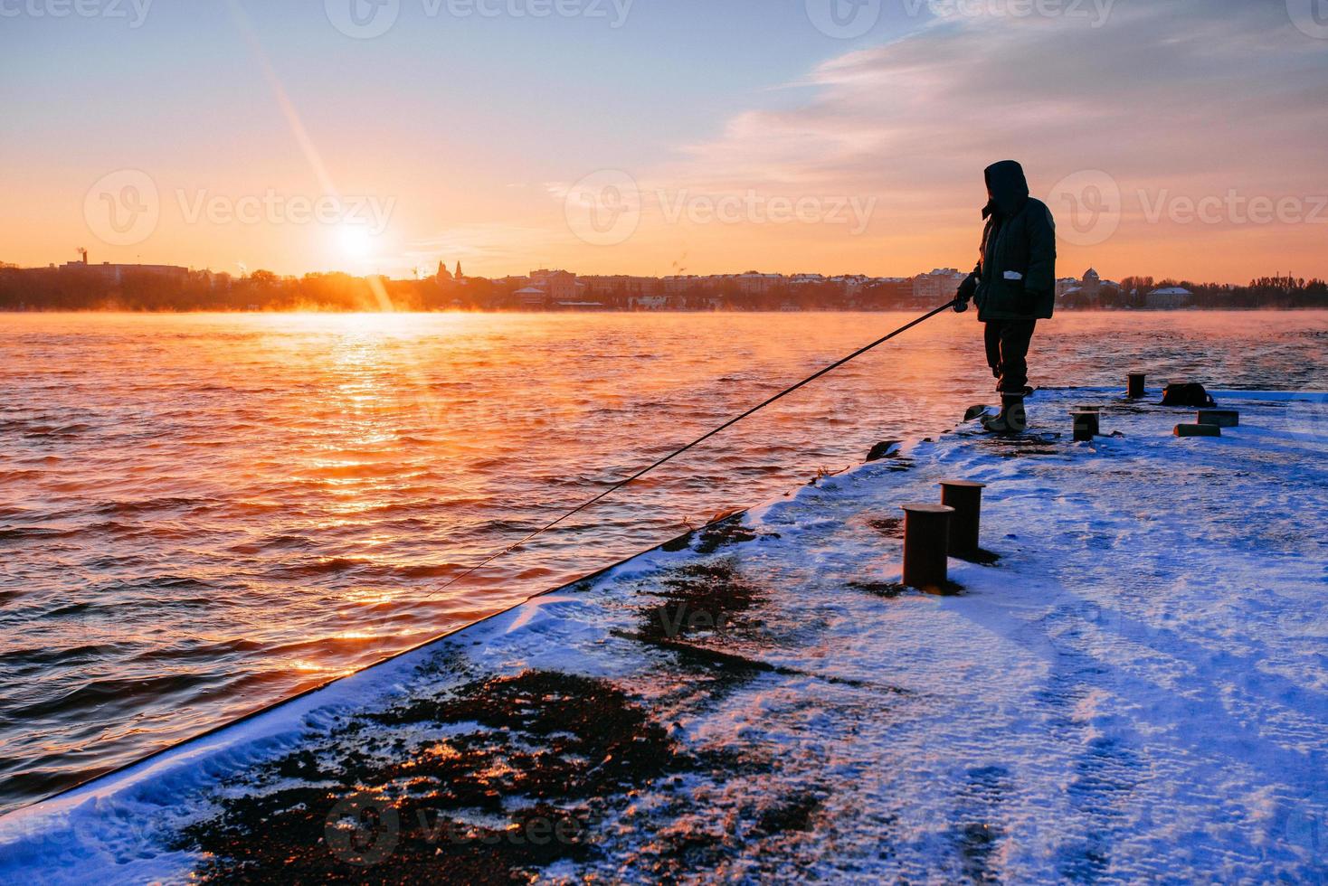 Silhouette of fishermen. photo