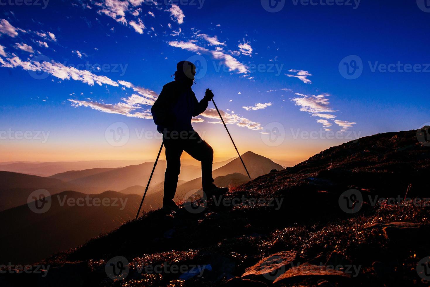 hiker at sunset photo
