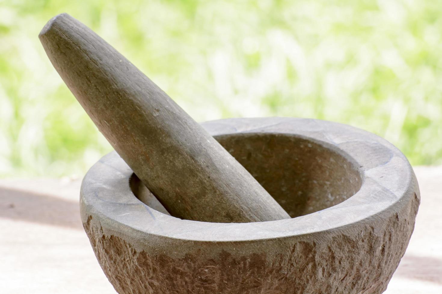 Pestle and mortar made of stone photo