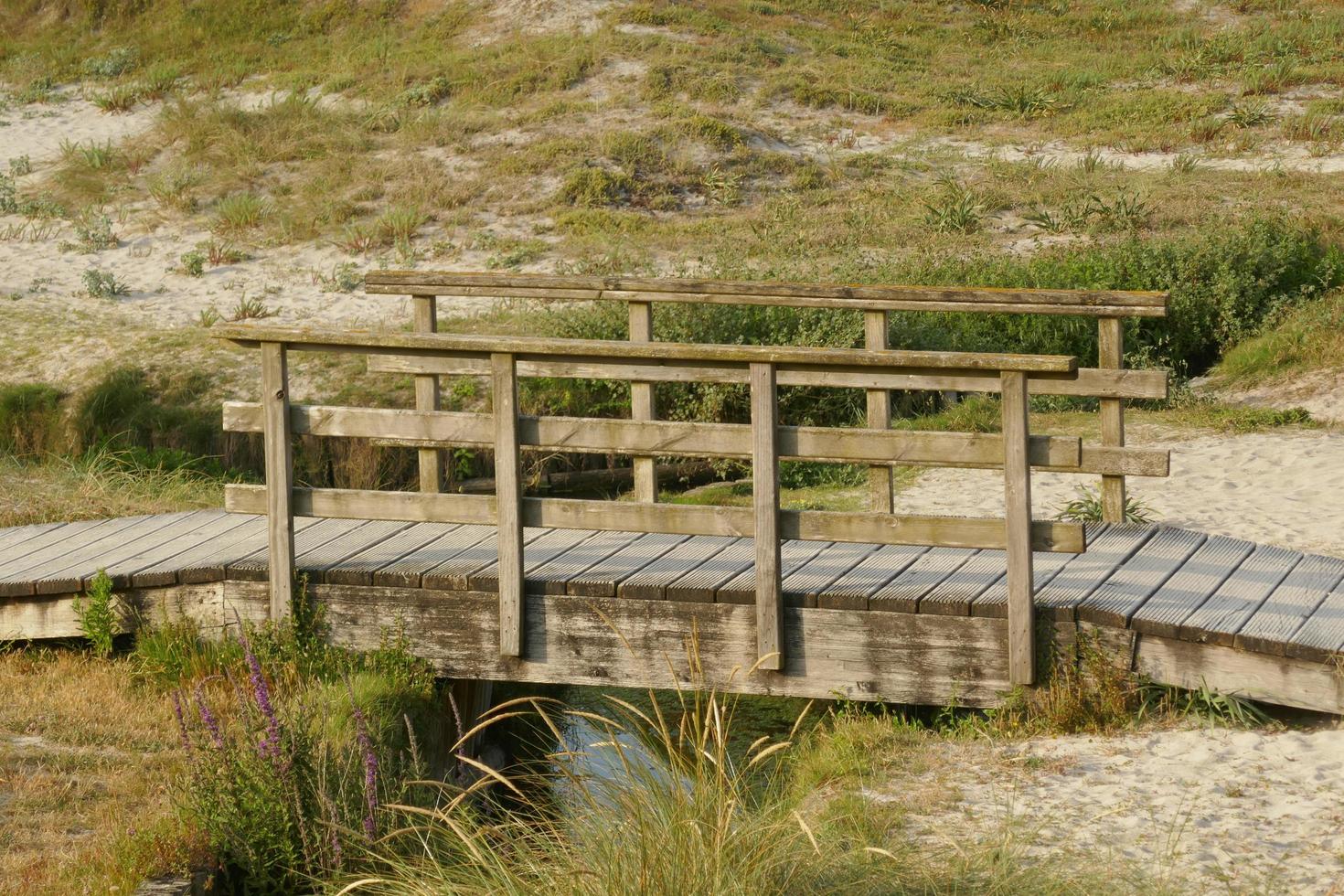 Wooden Bridge over a Small Creek photo