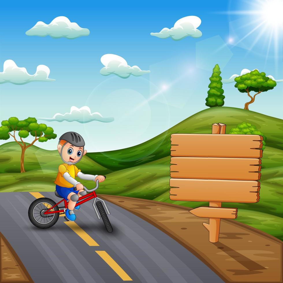 A cyclist rides a bike on a road among the hills vector