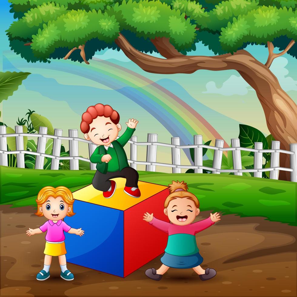 Cheerful the children playing with block in park vector