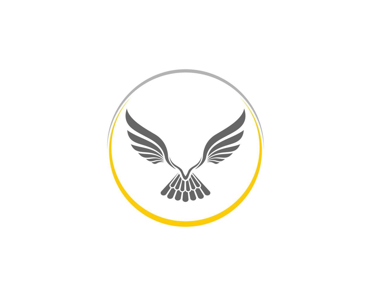 Abstract flying eagle in the circle logo vector