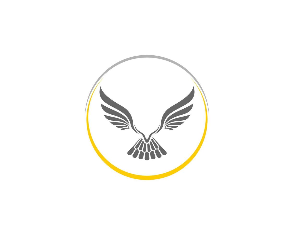 Abstract flying eagle in the circle logo vector