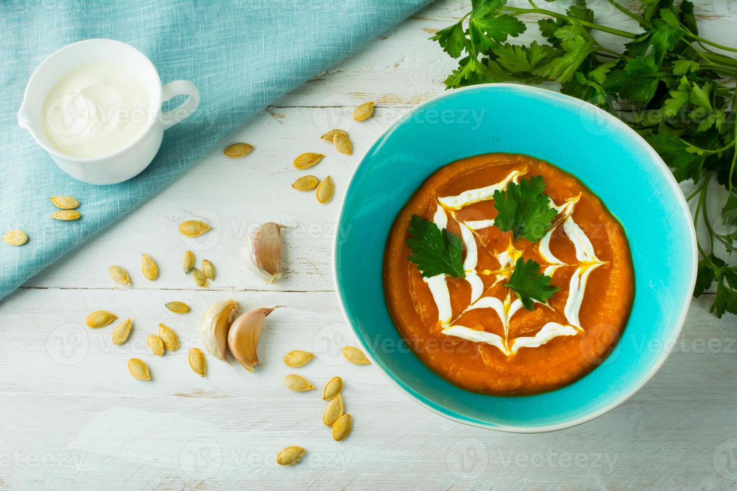 Creamy pumpkin vegetable soup photo