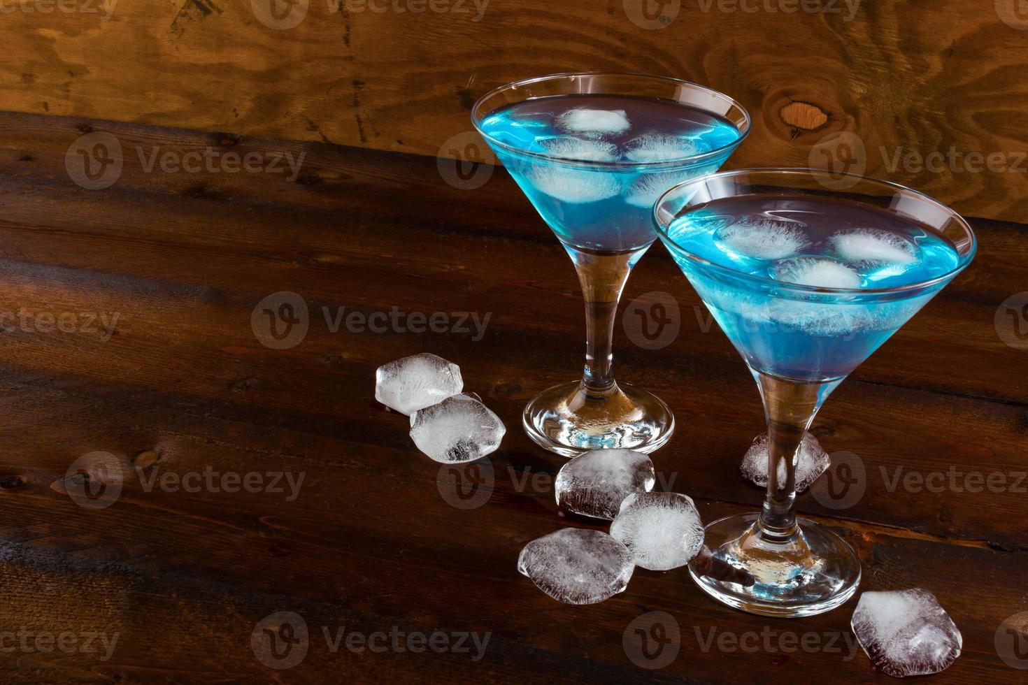 Blue cosmopolitan cocktail with ice photo