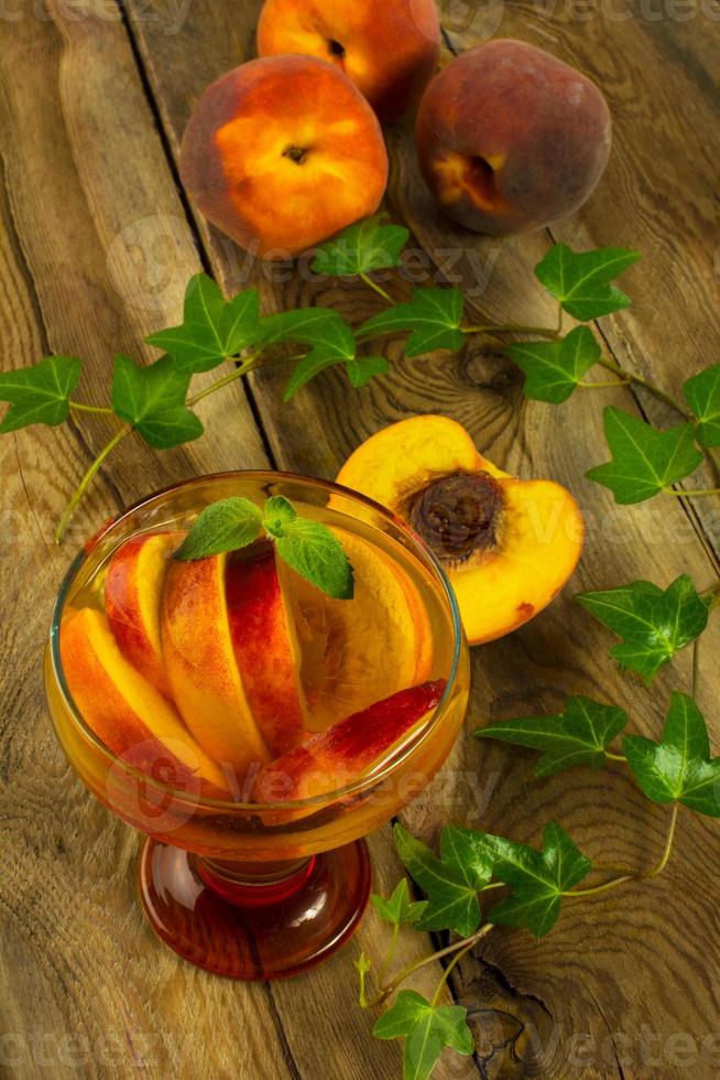 Cold drink with peaches photo