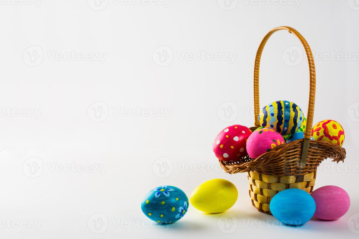 Easter eggs in the basket photo