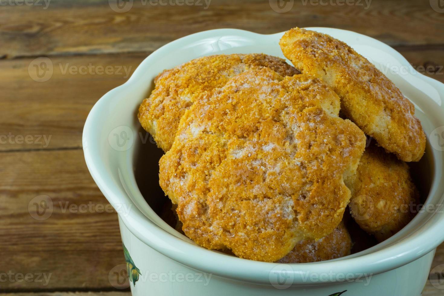 Cookies in a porcelain jar close up photo