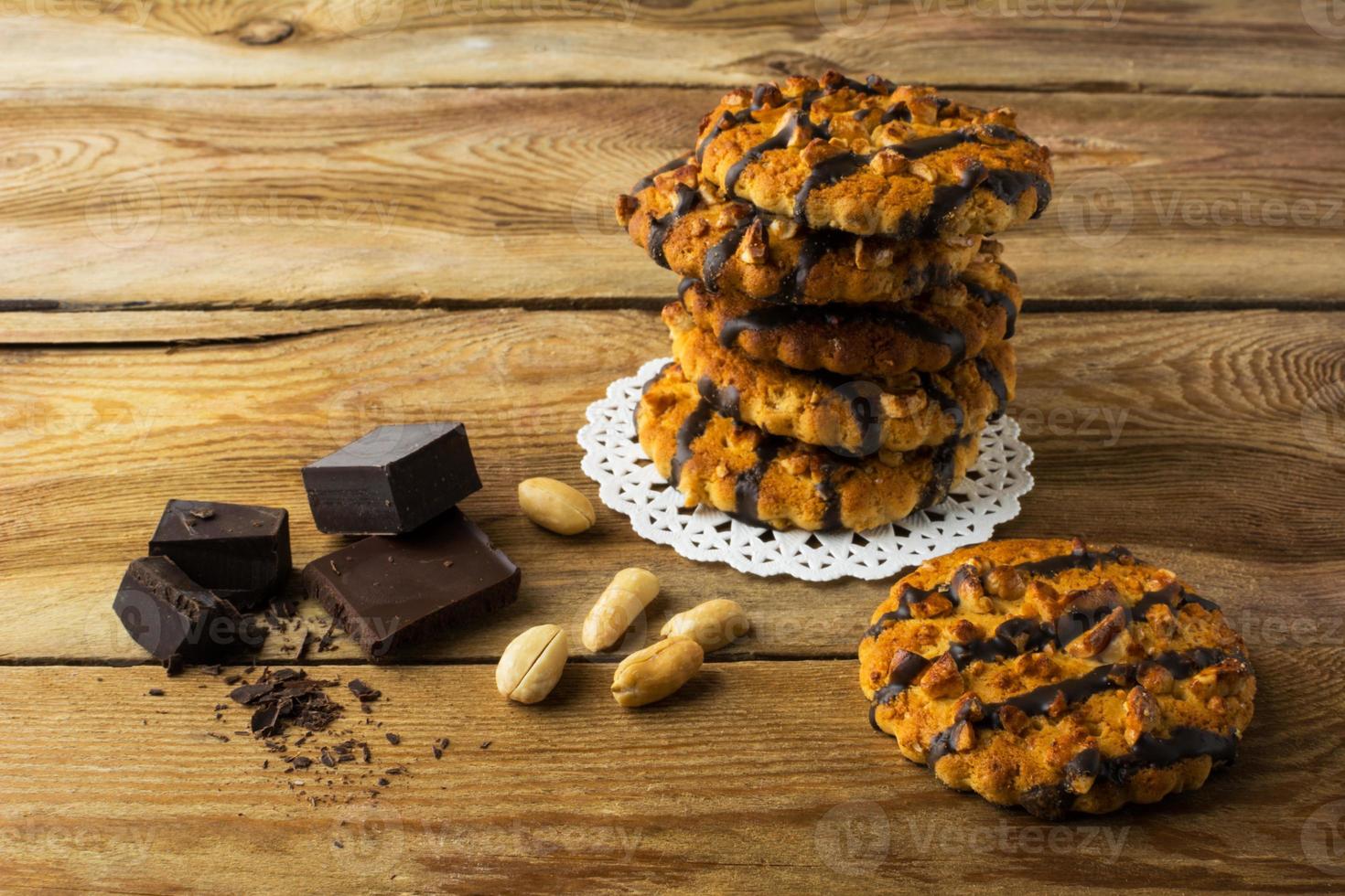 Stack of chocolate coating peanut cookies photo