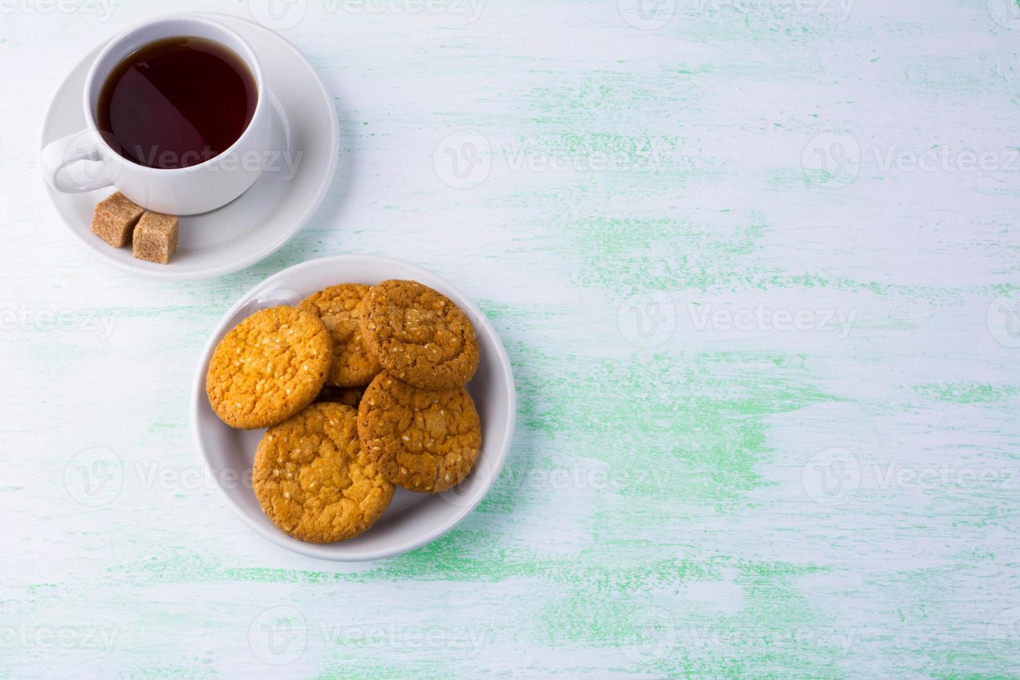 Sesame biscuits and cup of tea photo