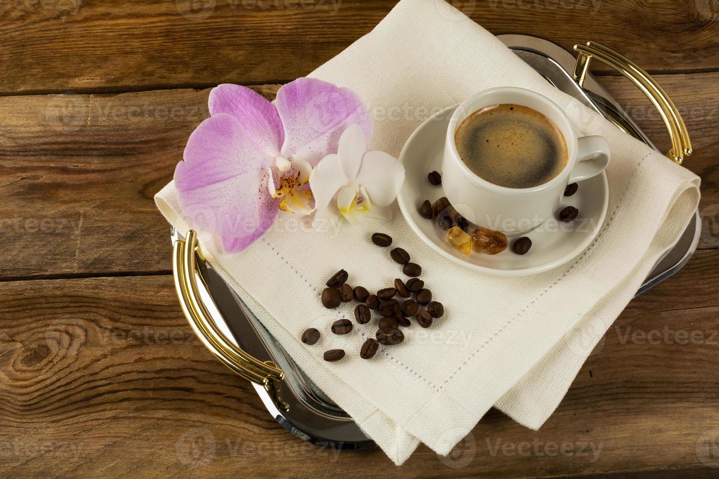 Coffee cup served on the serving tray photo