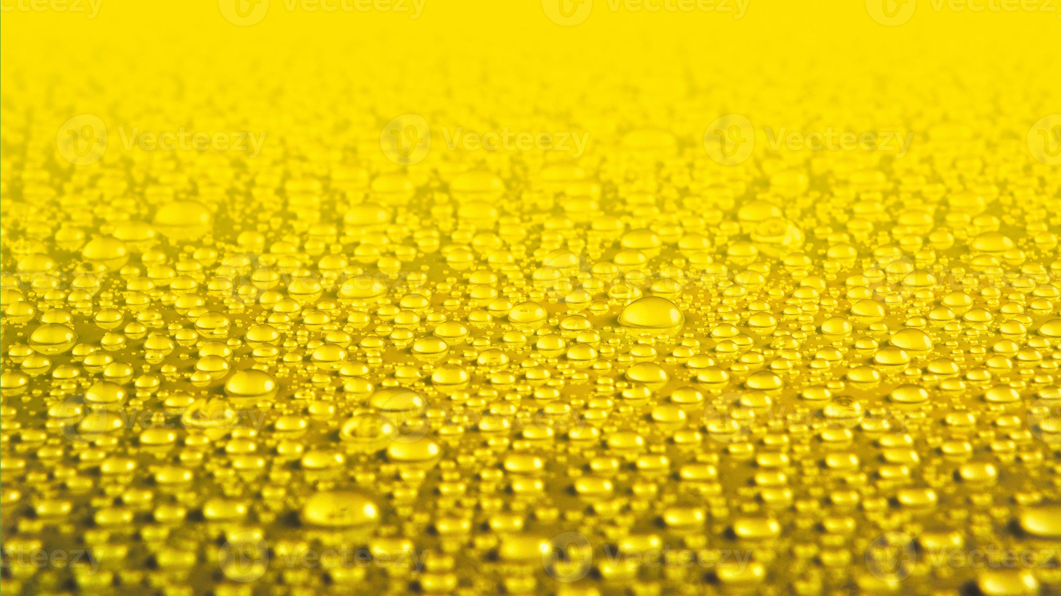 Yellow water drops background 6963145 Stock Photo at Vecteezy