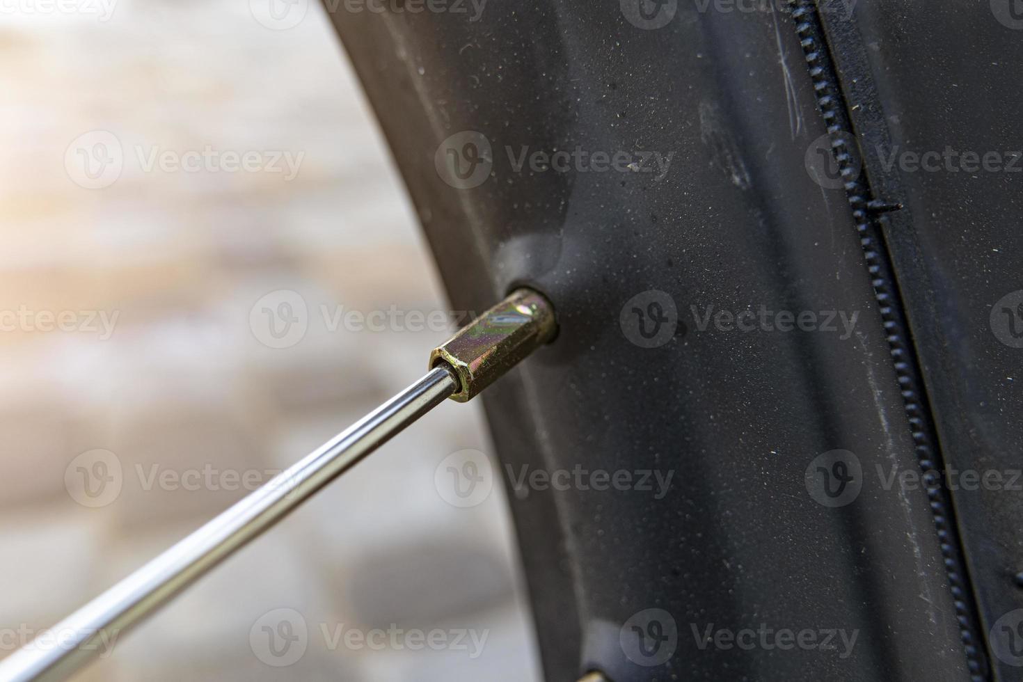 motorcycle spoke close up macro photo . Tension system. 6964111 Stock