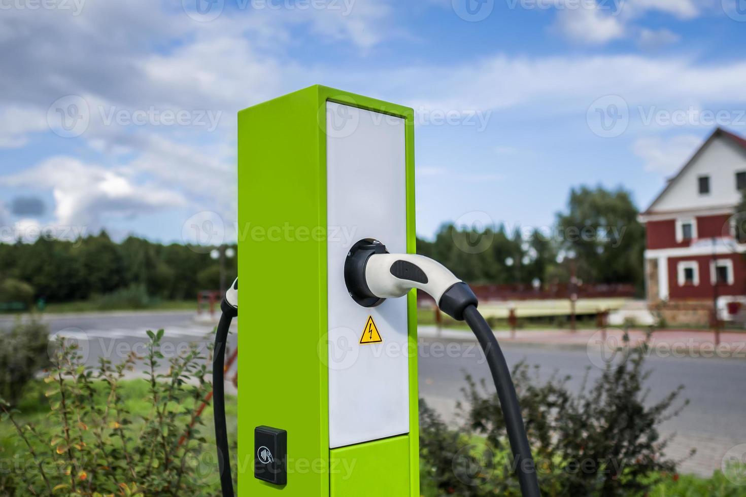 Modern and high technology of transportation electric vehicle charging  station with plug of power cable supply for Ev car or hybrid photo