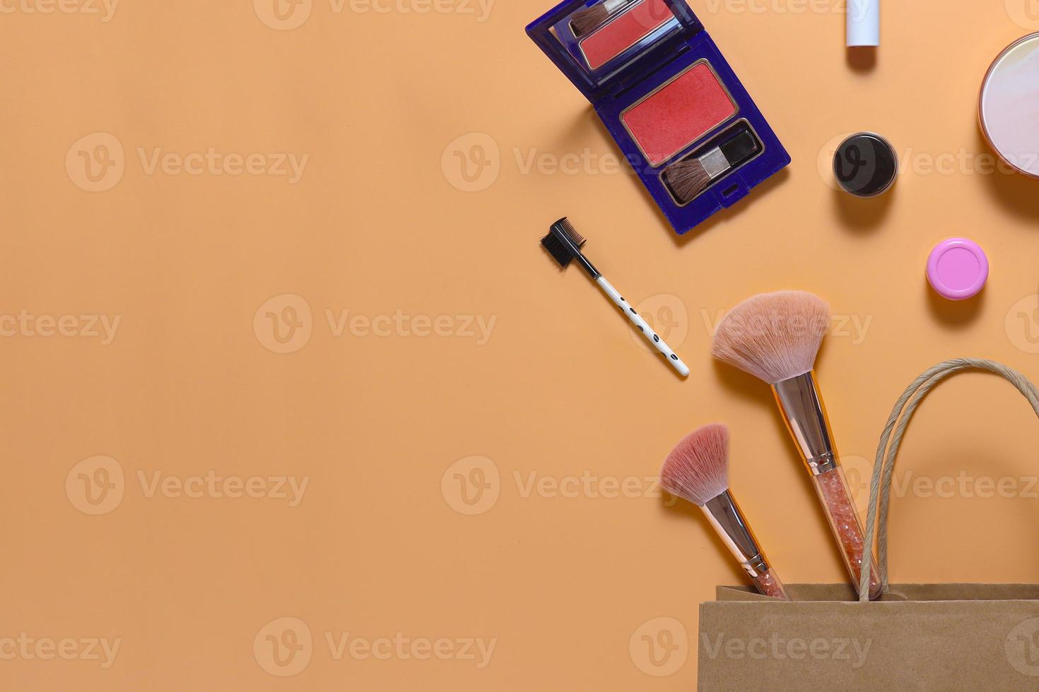 Creative flat lay composition of make up set with copy space photo