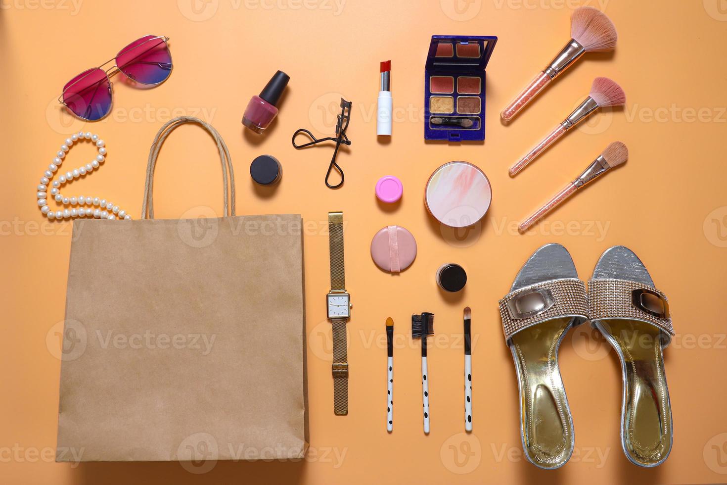 Creative flat lay composition of woman fashion and beauty accessories photo