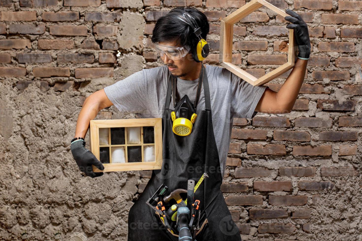 Carpenter man showing his wood craft photo