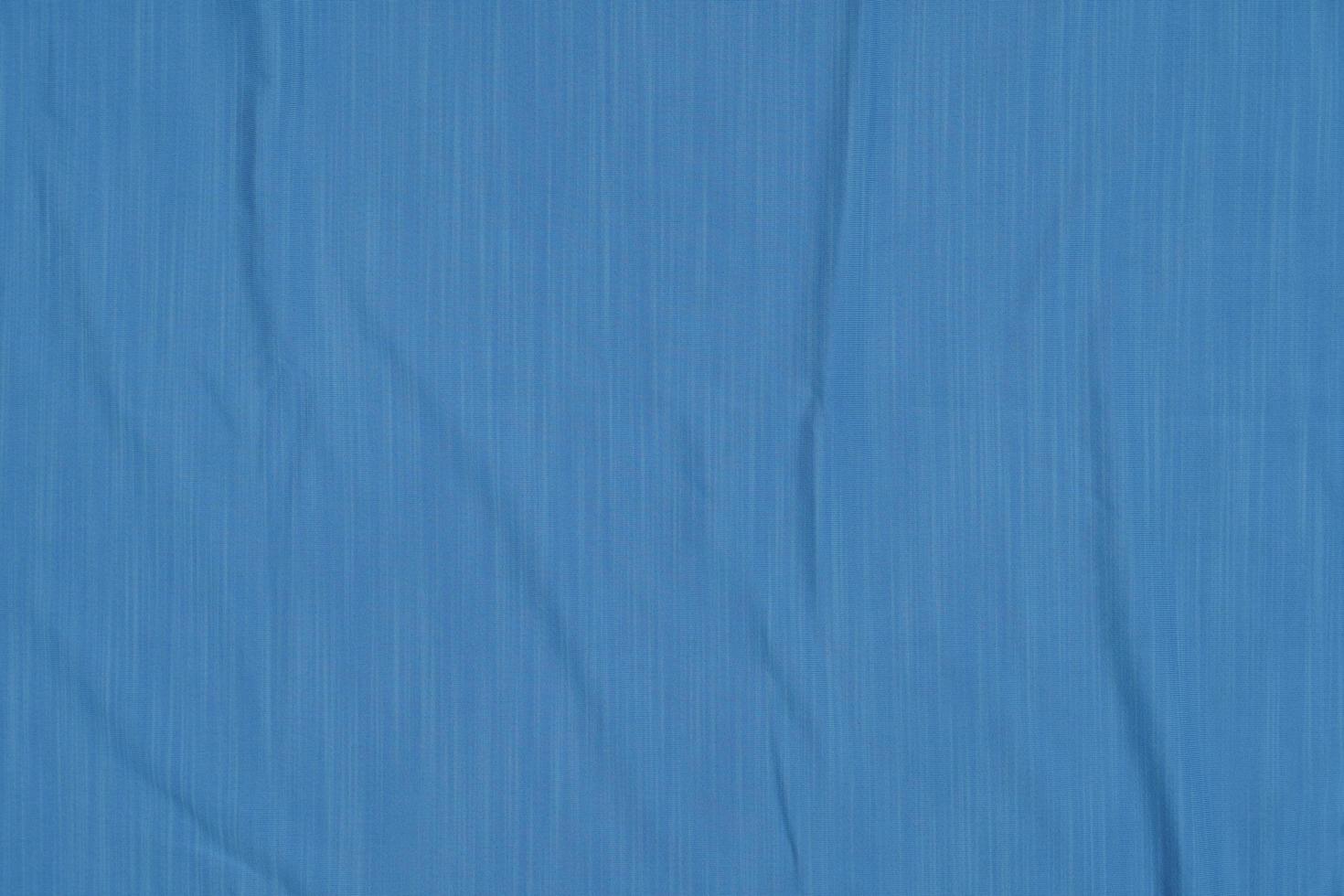 texture of blue sports jersey, shirt background photo