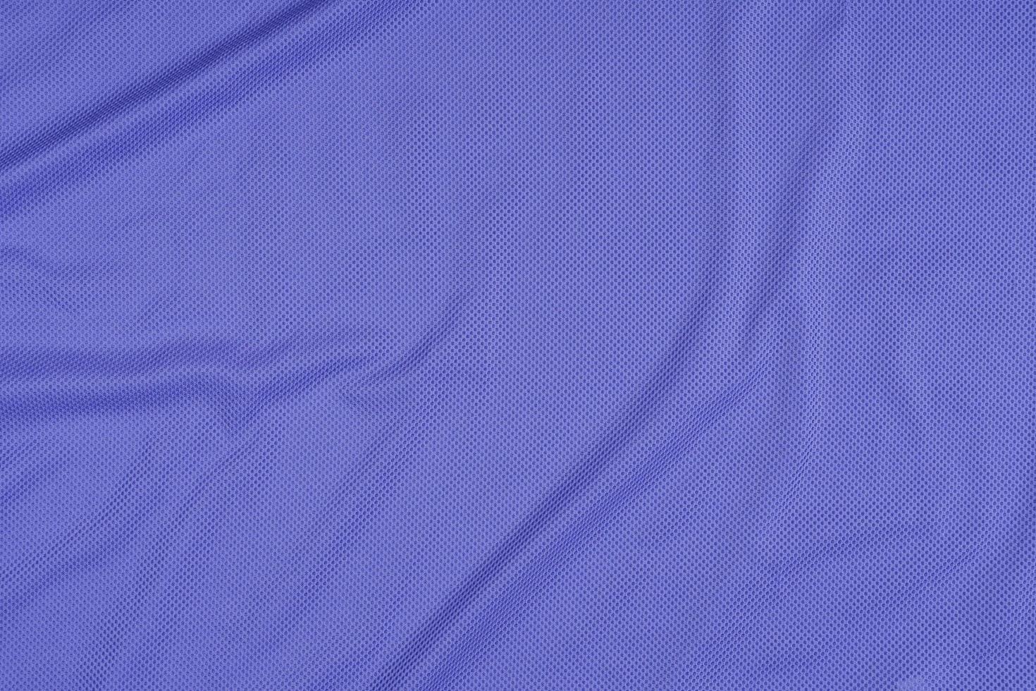 texture of blue vented sports jersey, shirt background photo