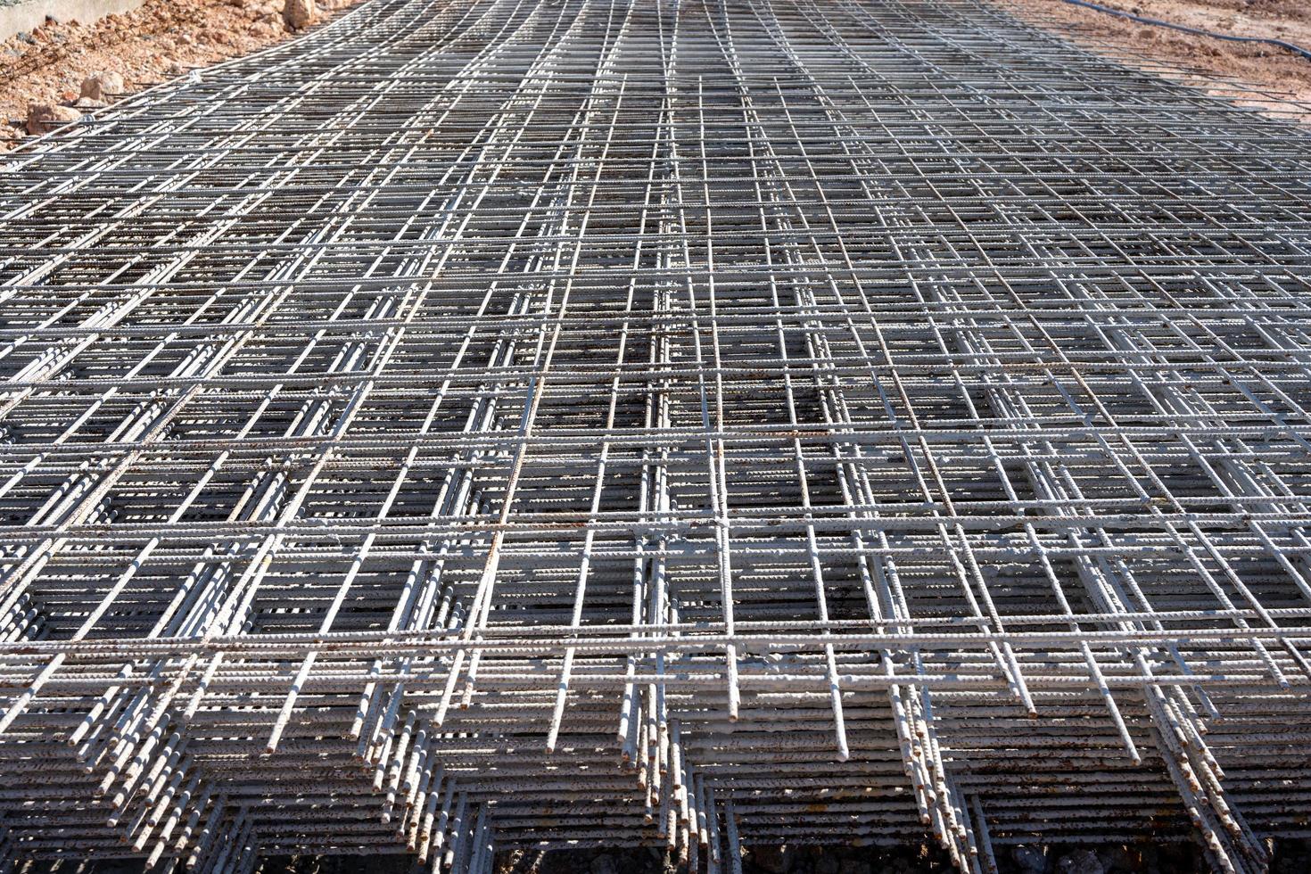 Steel grating is prepared to make cement floors for construction photo