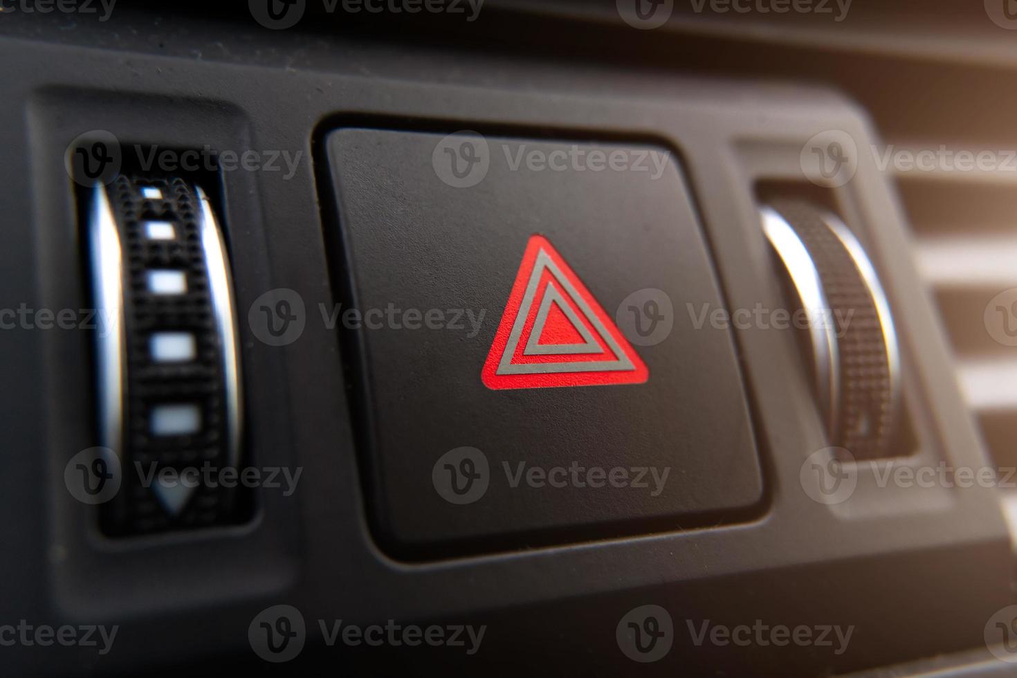 the emergency stop button of the car is a close-up on the dashboard photo